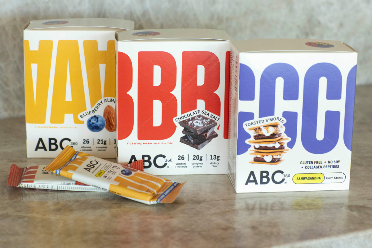 ABC 360® Blueberry Almond, Chocolate Sea Salt, and Toasted S’mores boxes with Protein Meal Bars in front.